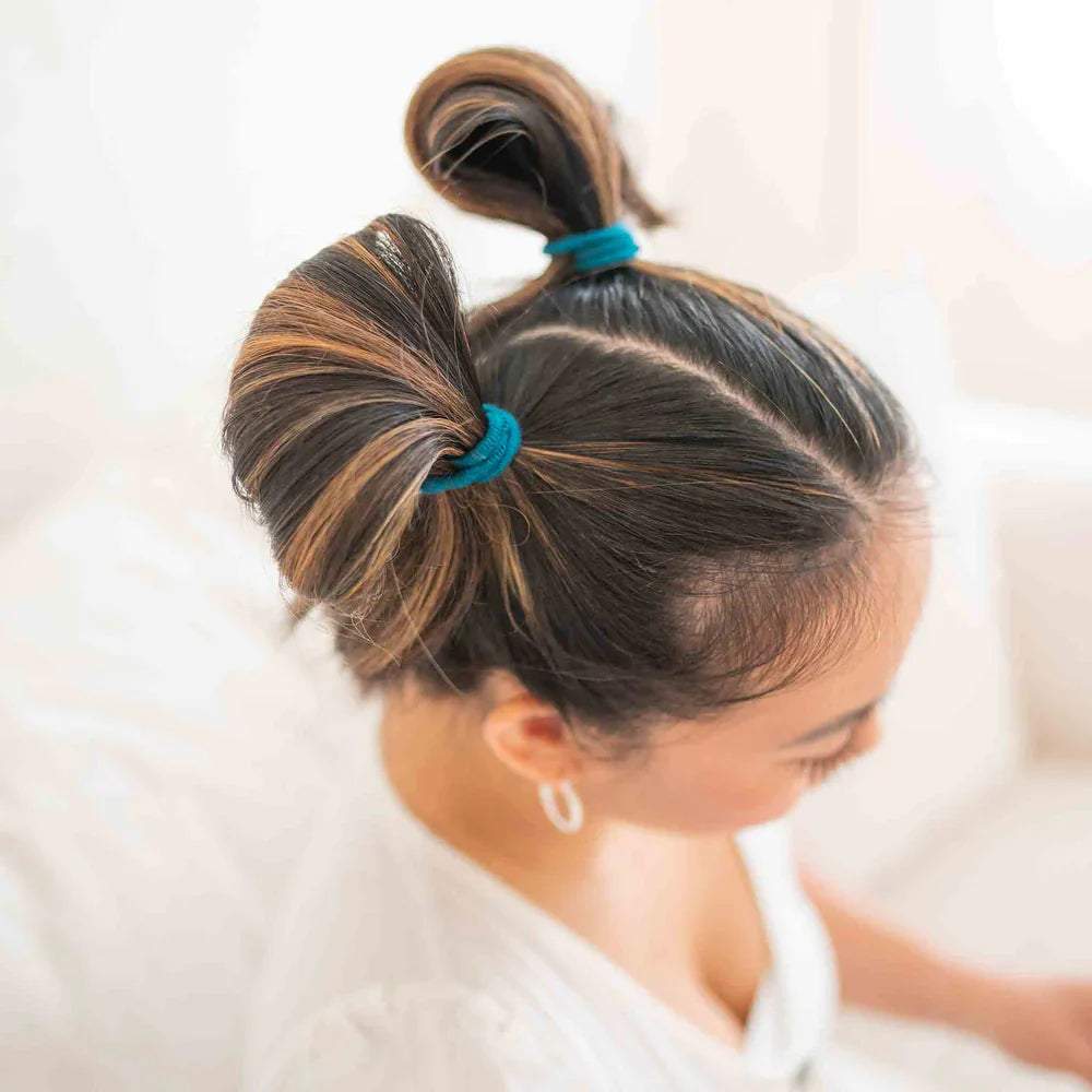 Why Your Hair Ties Might Be Doing More Harm Than You Think