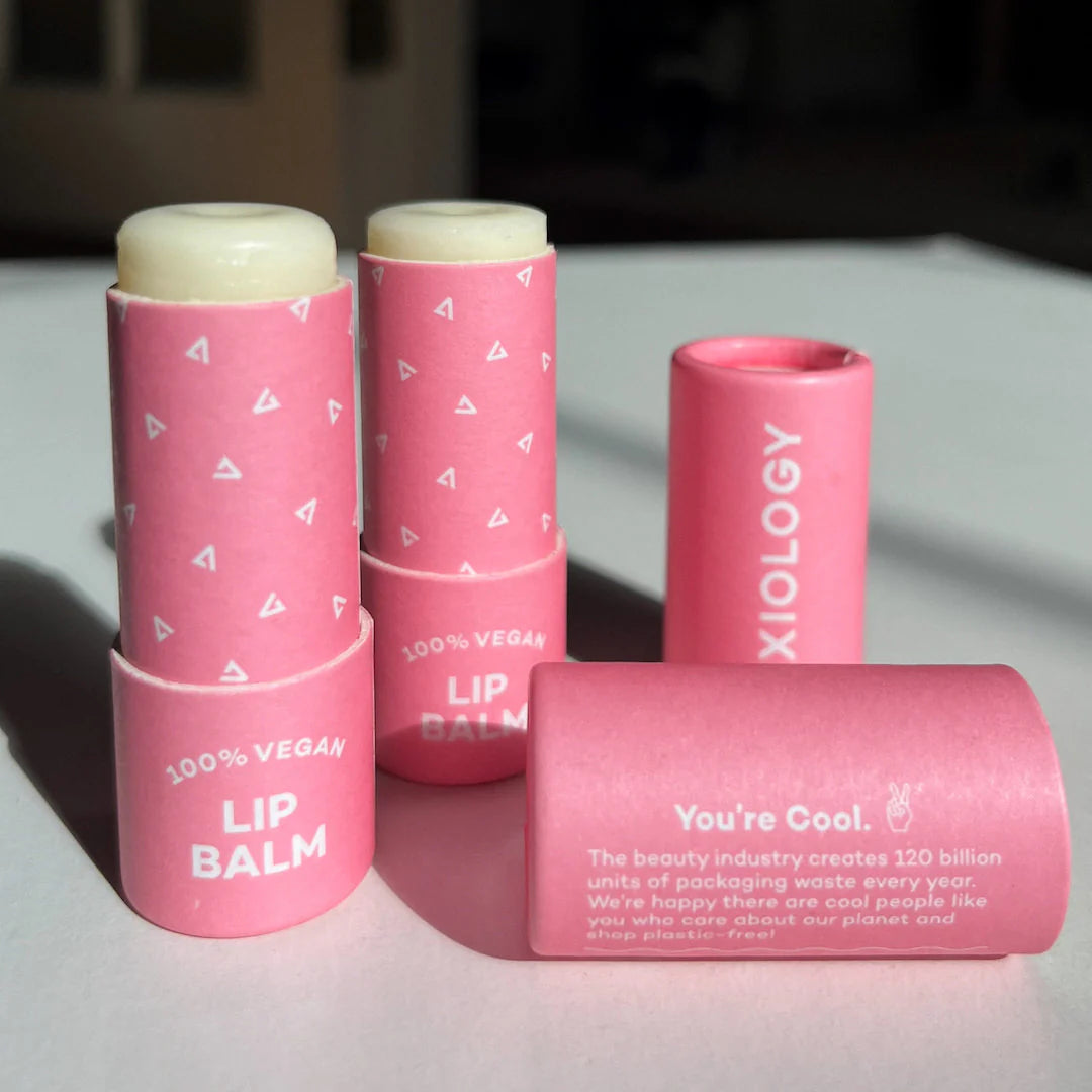 Axiology Lip Balm in compostable tpink tubes